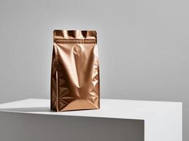 A bronze paper doypack is placed on a podium with an empty background. photo