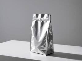 silver paper doypack placed on a podium on a blank background. photo