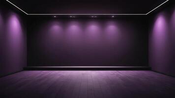 The interior of the auditorium is empty with purplish black walls and floors. photo