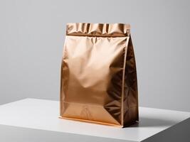 A bronze paper doypack is placed on a podium with an empty background. photo