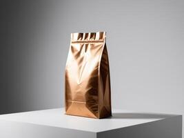 A bronze paper doypack is placed on a podium with an empty background. photo