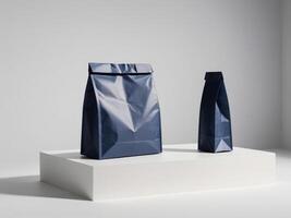 navy blue paper doypack placed on a podium on a blank background. photo