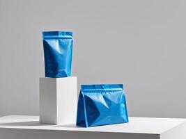 Blue paper doypack placed on podium on empty background. photo