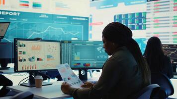 Company employee establishing project details and essential information about achieving business objectives, allocating budget and other resources. Strategic projection. Camera B. photo