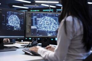 Programmer using AI tech on computer to do maintenance in server room providing storage. Worker in data center workplace using PC to enable artificial intelligence to process datasets for training photo