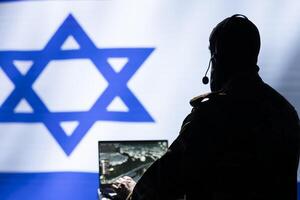 Communication systems operator working for Mossad using radio and satellite equipment, providing combat support. Israeli military dispatcher managing broadcasting networks, Israel flag photo