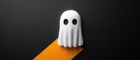 Minimalist Halloween Ghost Decoration on Black and Orange Background for Spooky Seasonal Themes photo
