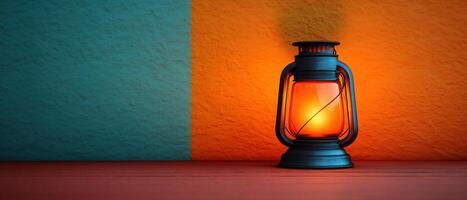 Vintage Lantern with Glowing Light Against Colorful Textured Wall in Modern Interior Setting photo