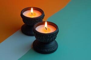 Elegant Black Candles with Warm Flames on Colorful Background for Relaxation and Meditation photo