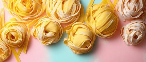 Fresh Homemade Pasta Nests on Colorful Background - Culinary Art and Italian Cuisine Concept photo