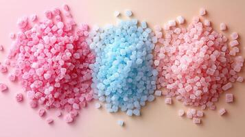 Colorful Piles of Pink and Blue Rock Candy Crystals on a Gradient Background photo