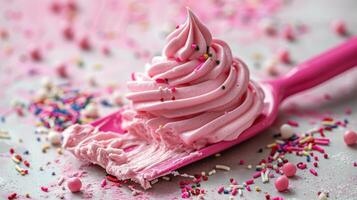 Delicious Pink Ice Cream with Colorful Sprinkles on a Pink Scoop - Close-Up Shot of Sweet Dessert photo