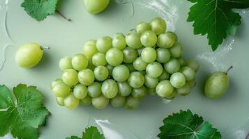 Fresh Green Grapes with Leaves on Light Green Background - High-Quality Stock Photo for Food and Nature Themes