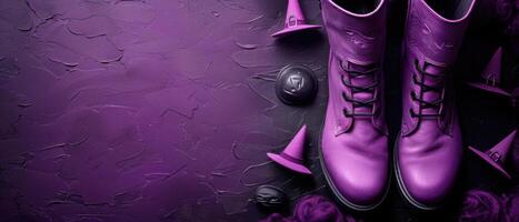 Purple Witch Boots and Hats on Textured Background - Halloween Themed Still Life photo