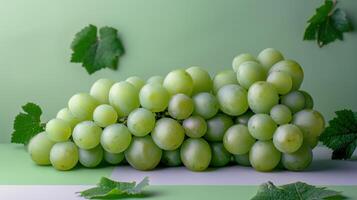 Fresh Green Grapes on a Green Background with Leaves - Close-Up of Juicy and Ripe Fruit photo