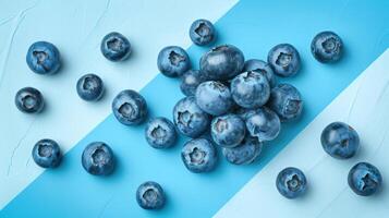 Fresh Blueberries on a Modern Blue and White Background - High-Quality Stock Photo for Food and Health Themes