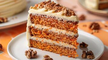 Delicious Slice of Carrot Cake with Cream Cheese Frosting and Walnuts on a White Plate photo