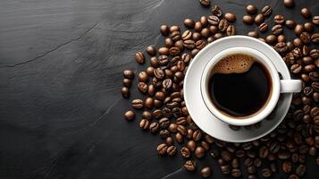 Freshly Brewed Coffee in White Cup with Coffee Beans on Black Slate Background photo