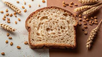 Close-up of a Slice of Whole Wheat Bread with Wheat Stalks and Grains on a Rustic Background photo