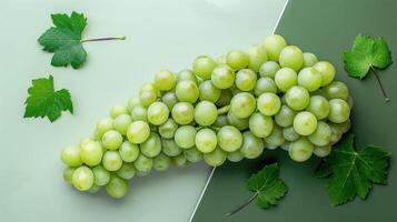 Fresh Green Grapes on a Two-Tone Background with Grape Leaves - High-Quality Stock Photo for Food and Nature Themes
