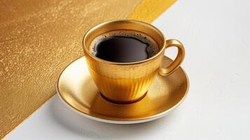 Luxurious Golden Coffee Cup on Elegant White and Gold Background - Perfect for High-End Lifestyle and Beverage Concepts photo