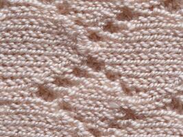 beige knitted wool fabric texture background patterned surface photo