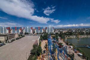 Top view from Ferris wheel of Altyn Eye Park and lake in Shymkent in summer photo