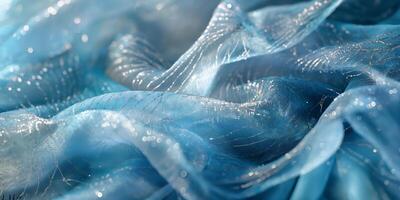 Enchanting Blue Fabric with Silver Sparkles and Waves Elegant Texture Background photo