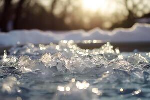 Melting Ice in Sunlight with Bokeh Effect and Snowy Background Captured at Sunset photo