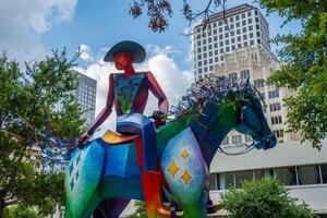 Austin, Texas - 15 June 2024. Tracking the end of the rainbow statue by Ion Art on 8th street of Austin, TX photo