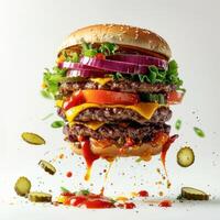 a high-resolution image of an impressive hamburger being launched into the air with great force. photo