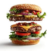Huge burger with lots of toppings. It's almost as tall as the bun itself. photo