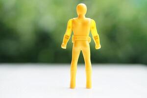 Model of human plastic toy. Concept, Toy for kids, enhance imagination in childhood with toy characters of superhero. Fantasy comic fiction from cartoons, movie. photo