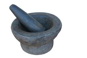 Old granite mortar and pestle on white background. Concept, kitchen utensils .Thai cooking tool, use to pound chili paste or curry paste. photo