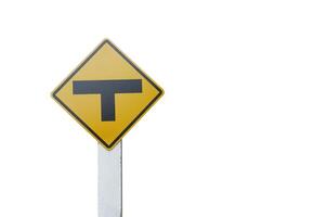 T junction, intersection sign yellow sign. Concept, Transportation symbol. Warning traffic sign to drive slowly and watch out for the intersection ahead. giving direction for transportation. Guidepost photo