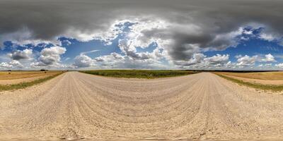 spherical 360 hdri panorama on side of gravel road with rain storm clouds in dark sky in equirectangular seamless projection, as skydome replacement in drone panoramas, game development photo