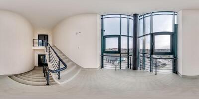 hdri 360 panorama view in empty modern hall near panoramic windows with columns, staircase and doors in equirectangular full spherical projection, ready for AR VR content photo