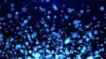 Abstract flying stream of blue glowing particles and bokeh dots on a dark background. seamless loop video