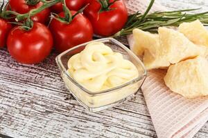Cheese sauce in the bowl photo