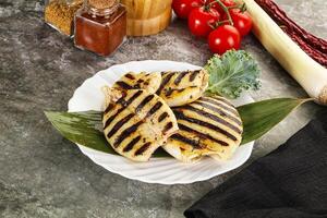 Grilled squid in the plate photo