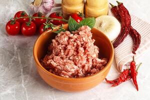 Raw minced pork uncooked meat photo