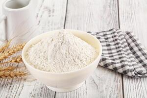 Wheat flour heap for bake photo