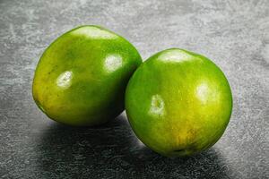 Two ripe green exotic avocado fruit photo