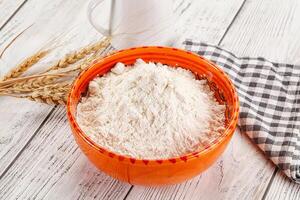 Wheat flour heap for bake photo