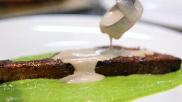 grilled salmon with mashed peas, Salmon steak, Red fish piece with green pea puree. healthy meal video