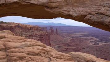 View from Mesa Arch in Canyonlands National Park near Moab, Utah, USA video