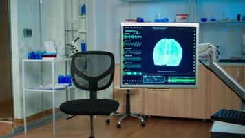 Medical laboratory with nobody in it modernly equipped prepared to investigating brain functions using high tech and neurology tools for scientific research, technologically advanced office video