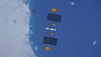 Telecommunication satellite floating planet in space, the north hemisphere of earth. Spaceship orbiting in the univers, shuttle into atmosphere. Images from NASA. 3D render animation. video