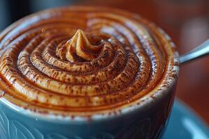 Close up of a delicious coffee cup topped with whipped cream photo