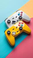 Colorful Game Controllers on a Vibrant Background. Two game controllers photo